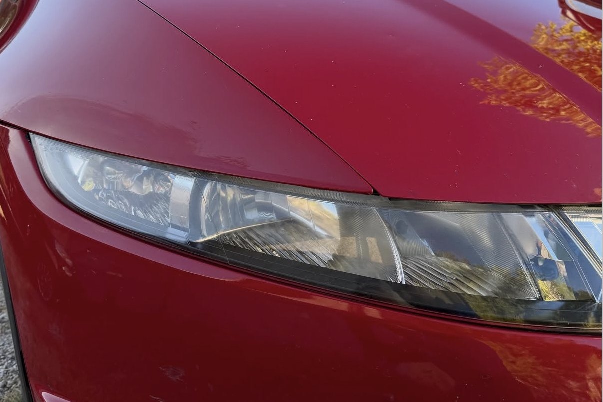 Lo stesso faro Honda brillante dopo il ripristino