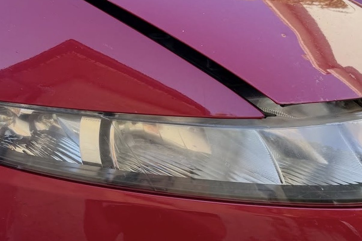 Faro Honda opaco prima del ripristino